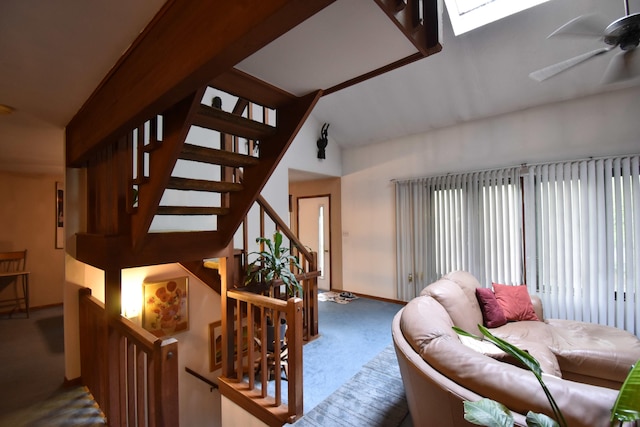 158 Saunders Dr, Bushkill, PA 18324 - carpeted living area featuring lofted ceiling, ceiling fan, and stairs