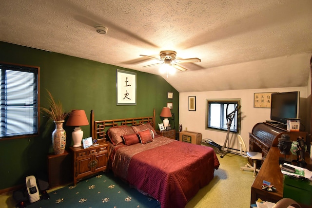 158 Saunders Dr, Bushkill, PA 18324 - carpeted bedroom with a textured ceiling, lofted ceiling, ceiling fan, and baseboard heating
