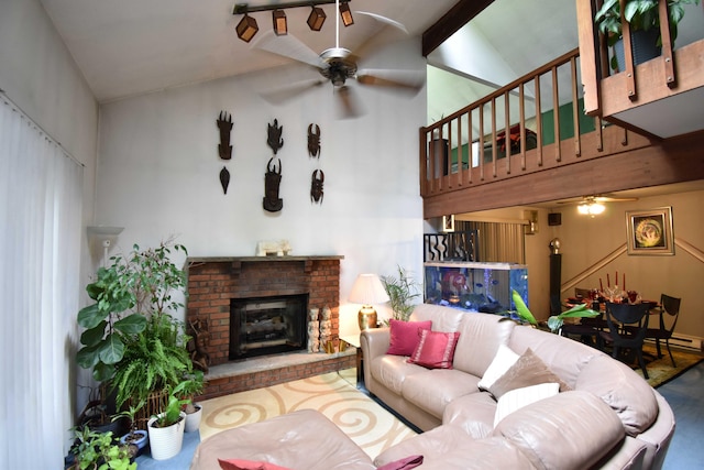 158 Saunders Dr, Bushkill, PA 18324 - living area with a ceiling fan, high vaulted ceiling, a brick fireplace, and stairs