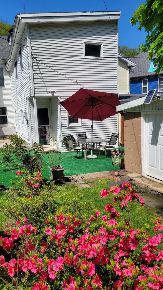 129 W Broadway, Jim Thorpe, PA 18229 - back of house featuring a shed, an outdoor structure, and a yard
