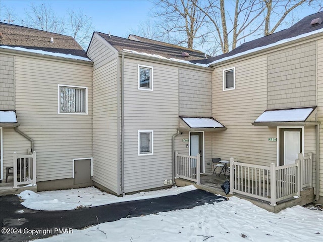 view of snow covered property