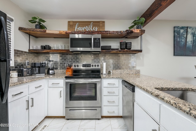 kitchen with decorative backsplash, marble finish floor, stainless steel appliances, white cabinetry, and open shelves