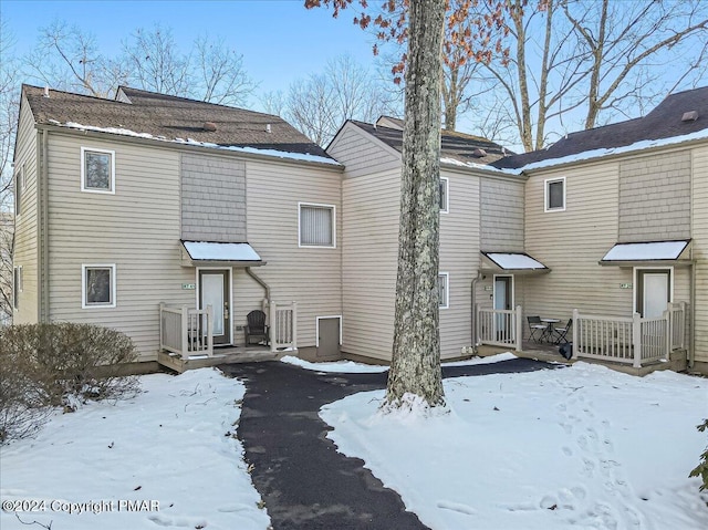 view of snow covered property