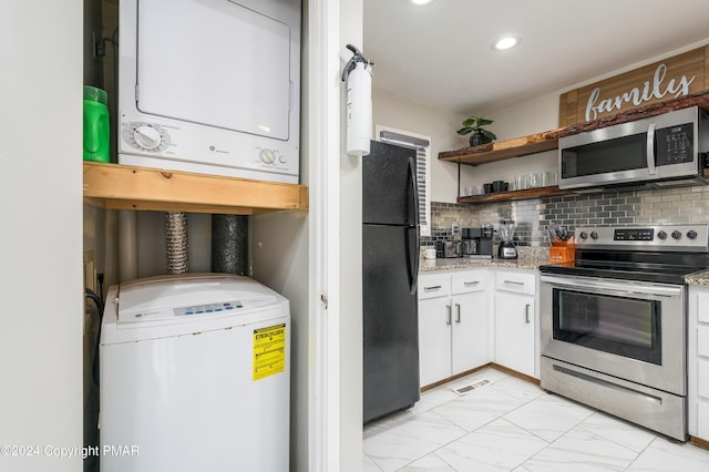 kitchen featuring white cabinetry, marble finish floor, appliances with stainless steel finishes, open shelves, and tasteful backsplash