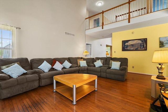2358 Snapdragon Pt, East Stroudsburg, PA 18301 - living area with a towering ceiling and wood finished floors