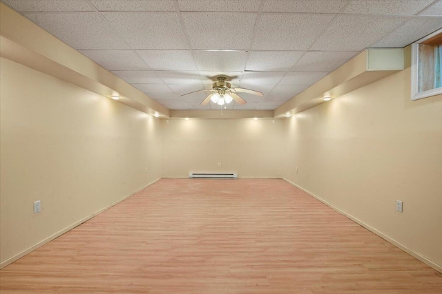 2358 Snapdragon Pt, East Stroudsburg, PA 18301 - finished basement with baseboard heating, light wood-style floors, a drop ceiling, and a ceiling fan