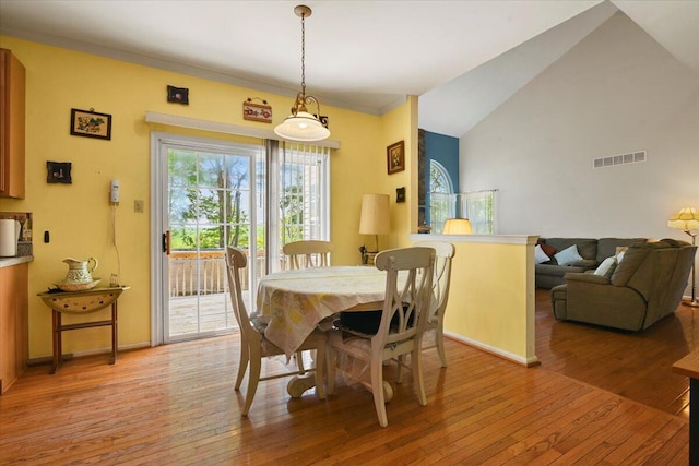 2358 Snapdragon Pt, East Stroudsburg, PA 18301 - dining area featuring light wood-type flooring and lofted ceiling