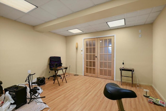 2358 Snapdragon Pt, East Stroudsburg, PA 18301 - office space featuring french doors, a drop ceiling, and wood finished floors