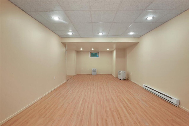 2358 Snapdragon Pt, East Stroudsburg, PA 18301 - finished basement with a baseboard radiator, wood finished floors, and recessed lighting