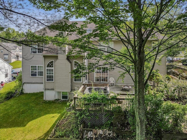 2358 Snapdragon Pt, East Stroudsburg, PA 18301 - back of house featuring a deck and a yard