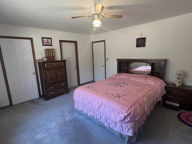 carpeted bedroom with ceiling fan