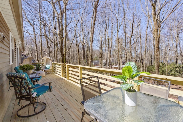 7 Park Ln, Lake Harmony, PA 18624 - deck featuring outdoor dining area and view of scattered trees