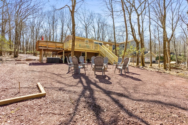 7 Park Ln, Lake Harmony, PA 18624 - view of yard with stairway, a wooden deck, and a fire pit