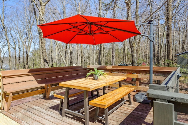 7 Park Ln, Lake Harmony, PA 18624 - wooden deck featuring outdoor dining area and a view of trees