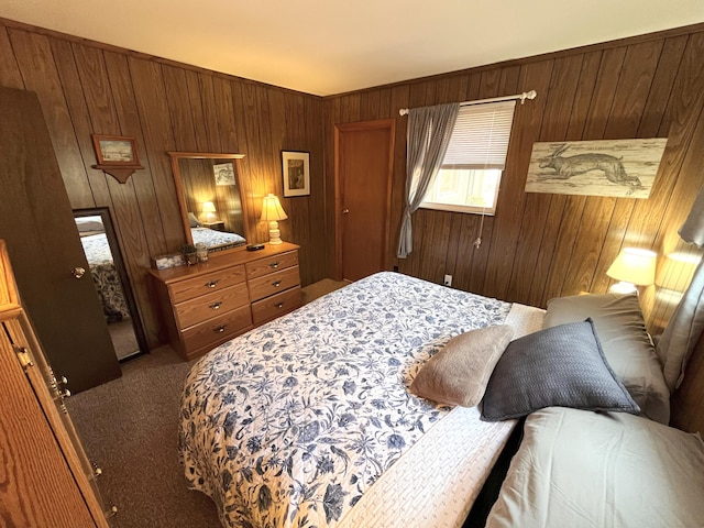 carpeted bedroom with wood walls