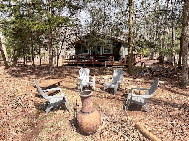 view of yard with a wooden deck