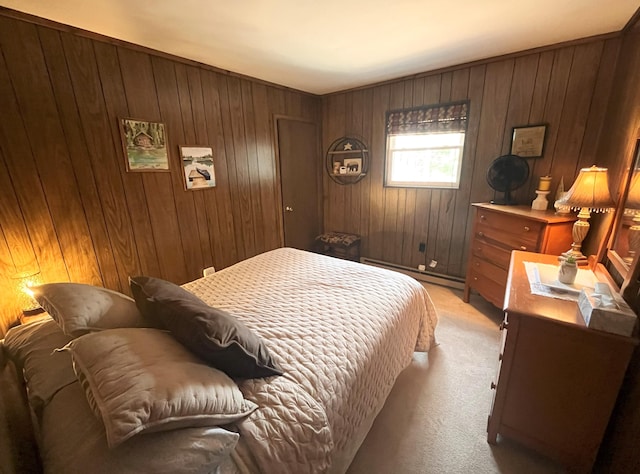 bedroom with wooden walls, light colored carpet, and a baseboard radiator