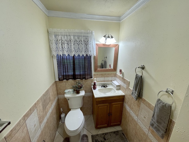 bathroom with toilet, tile walls, and crown molding