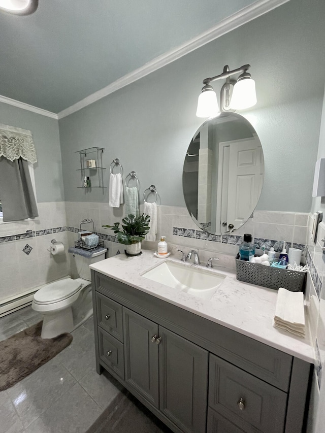 bathroom with toilet, vanity, tile walls, ornamental molding, and wainscoting