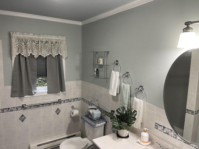 bathroom with a baseboard heating unit, crown molding, tile walls, and toilet