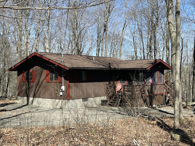 172 Larsen Dr, Clifton Township, PA 18424 - view of side of property featuring crawl space and roof with shingles