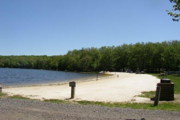 172 Larsen Dr, Clifton Township, PA 18424 - view of property's community with a forest view and a water view