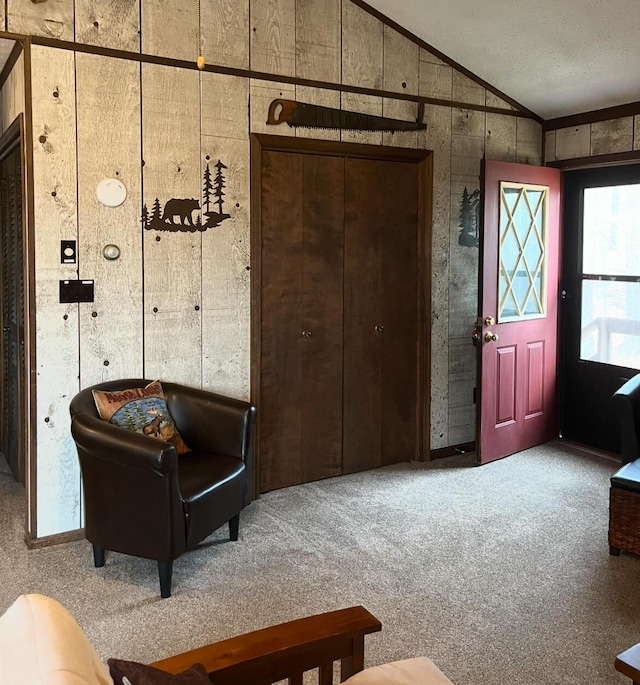 172 Larsen Dr, Clifton Township, PA 18424 - foyer entrance with vaulted ceiling, carpet floors, and ornamental molding