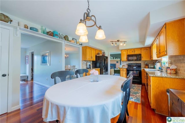 5622 Snowdrift Rd, Orefield, PA 18069 - dining room featuring dark wood-type flooring and baseboards