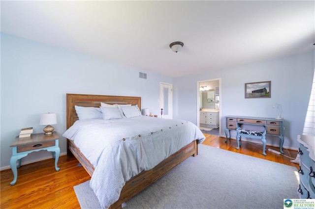 5622 Snowdrift Rd, Orefield, PA 18069 - bedroom with wood finished floors and ensuite bathroom