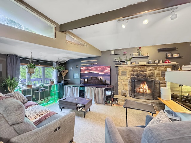 163 Granite Rd, Long Pond, PA 18334 - carpeted living room with vaulted ceiling, track lighting, and a fireplace