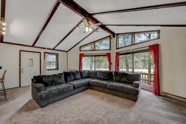 carpeted living area with a textured ceiling, vaulted ceiling with beams, a ceiling fan, and a healthy amount of sunlight