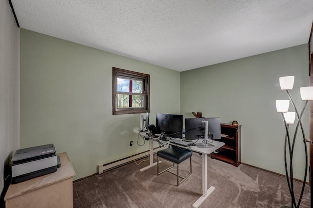 carpeted office space with a baseboard heating unit, baseboards, and a textured ceiling