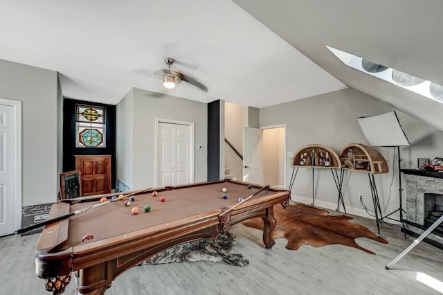 348 Mountain Top Lake Rd, Long Pond, PA 18334 - playroom with wood finished floors, ceiling fan, billiards, and a skylight