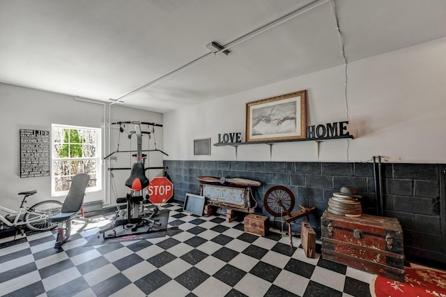 348 Mountain Top Lake Rd, Long Pond, PA 18334 - workout room with tile patterned floors and wainscoting