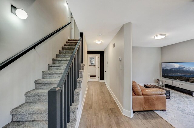 348 Mountain Top Lake Rd, Long Pond, PA 18334 - stairs with wood finished floors and baseboards