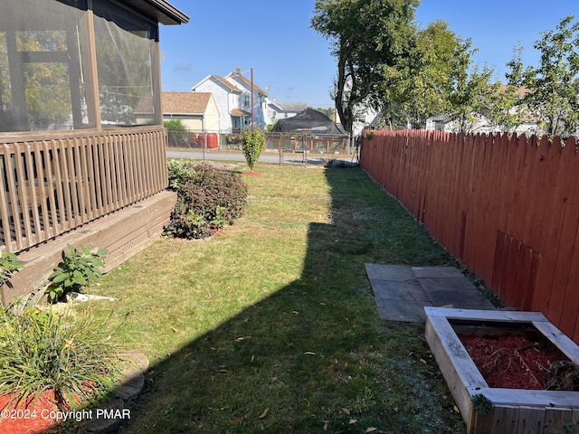 view of yard featuring a fenced backyard