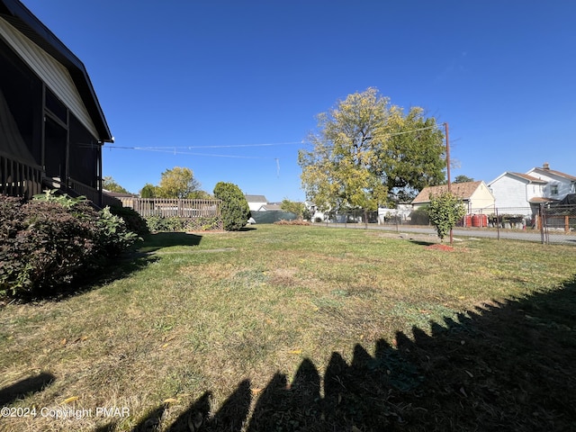 view of yard featuring fence