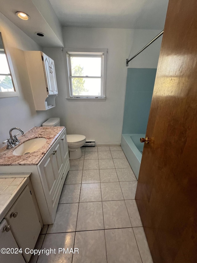 full bathroom with toilet, tub / shower combination, vanity, tile patterned flooring, and baseboards