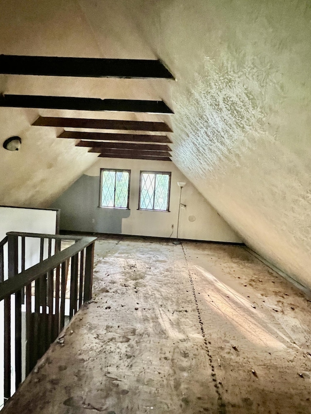bonus room featuring vaulted ceiling