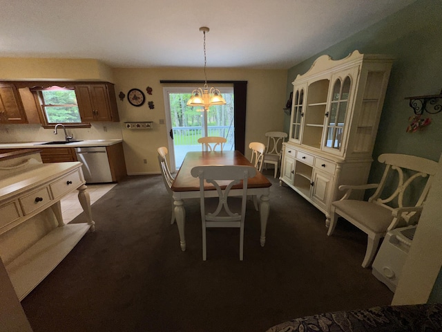 110 Alwen Ave, East Stroudsburg, PA 18301 - dining space with dark carpet and a chandelier