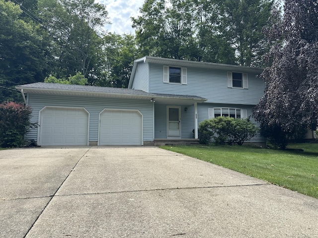 110 Alwen Ave, East Stroudsburg, PA 18301 - view of front of property featuring an attached garage, driveway, and a front yard