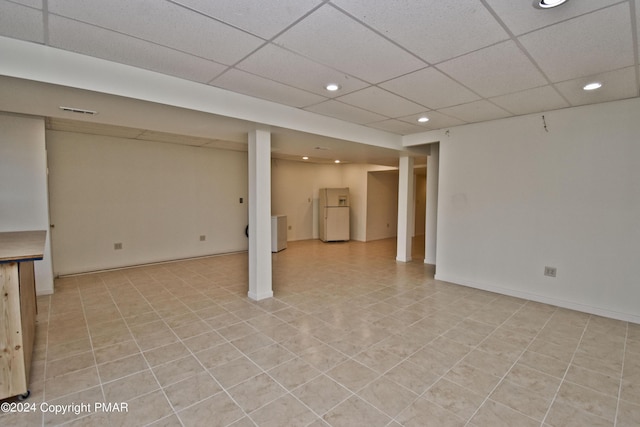 127 Bethpage Ter, Easton, PA 18042 - finished below grade area with freestanding refrigerator, recessed lighting, a drop ceiling, light tile patterned floors, and washer / clothes dryer