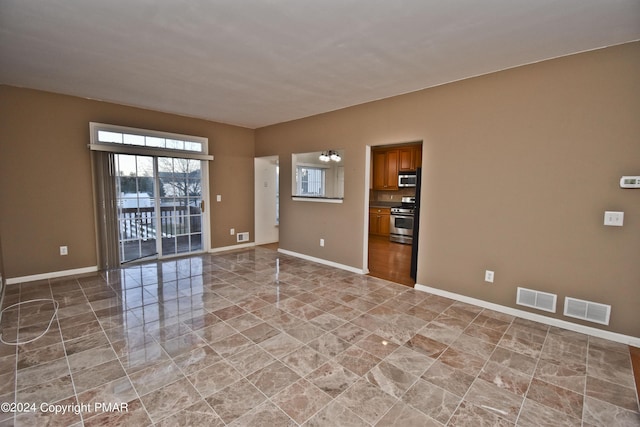 127 Bethpage Ter, Easton, PA 18042 - spare room with baseboards and light tile patterned floors