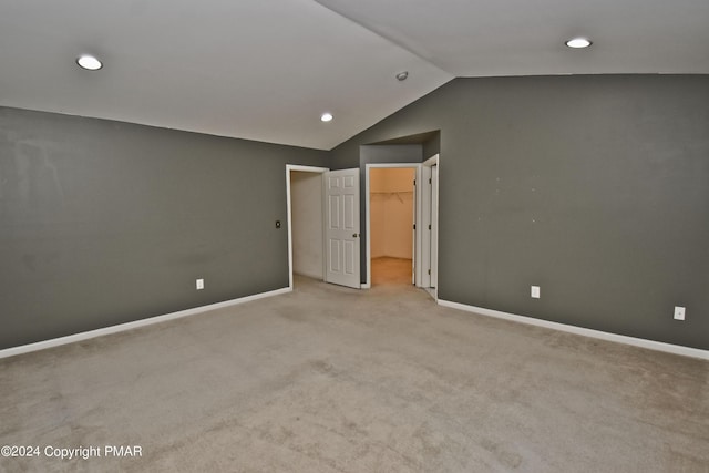 127 Bethpage Ter, Easton, PA 18042 - unfurnished bedroom with a walk in closet, lofted ceiling, light carpet, recessed lighting, and a closet