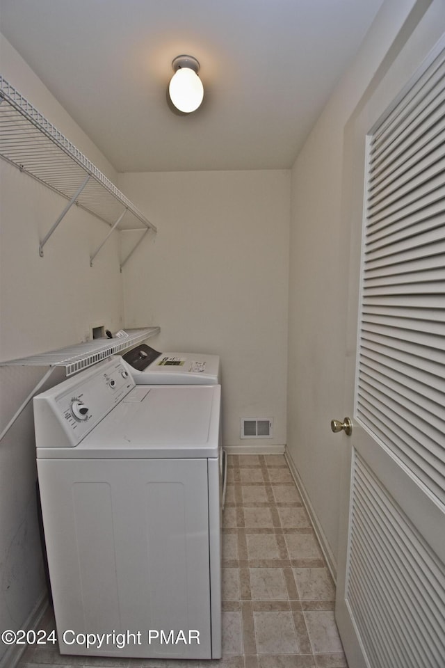 127 Bethpage Ter, Easton, PA 18042 - washroom with washer and clothes dryer and light flooring