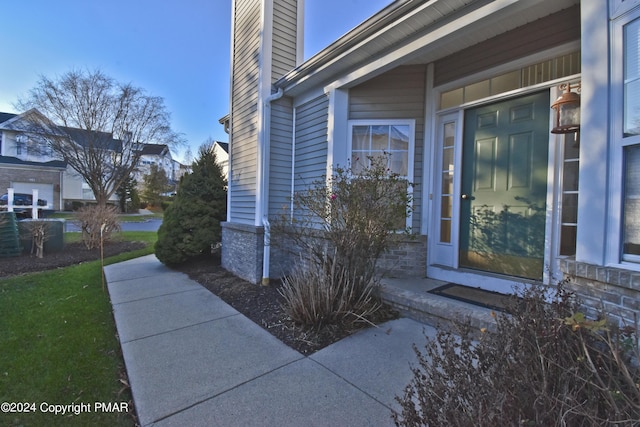 127 Bethpage Ter, Easton, PA 18042 - view of exterior entry with a chimney
