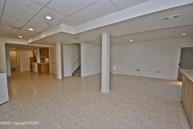 127 Bethpage Ter, Easton, PA 18042 - finished below grade area featuring a drop ceiling, recessed lighting, stairs, and light tile patterned floors