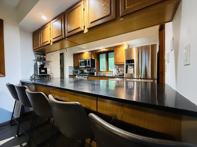 119 Sterling Cir, Bushkill, PA 18324 - bar featuring stainless steel appliances and backsplash