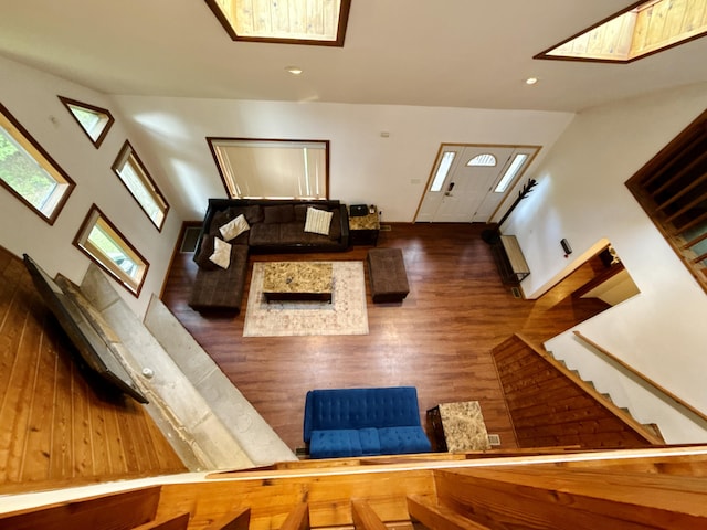 119 Sterling Cir, Bushkill, PA 18324 - unfurnished living room featuring a skylight, wood finished floors, and recessed lighting