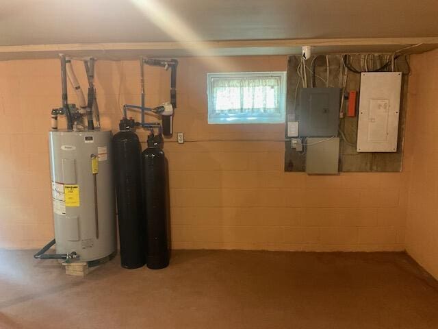 3124 Bluebird Dr, Bushkill, PA 18324 - basement with electric panel, electric water heater, a water softener, and concrete block wall